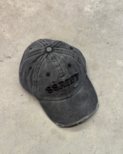 SŚAINT LOGO CAP - BLACK ACID WASH