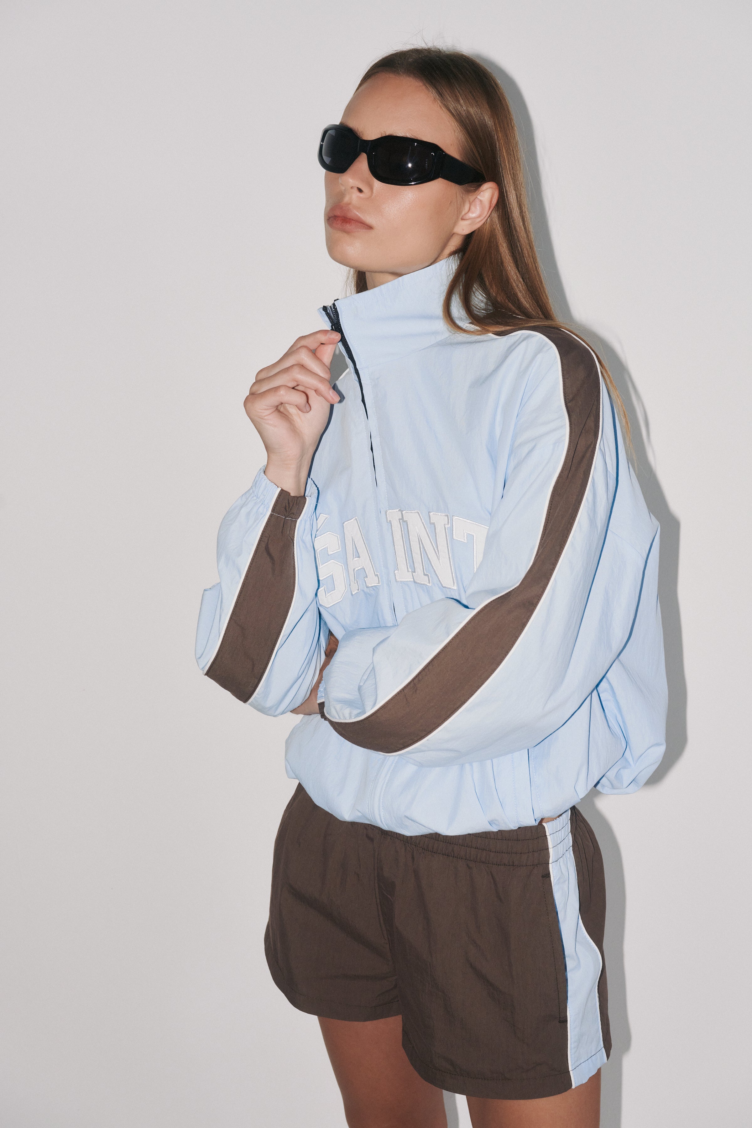 THE GROUNDS TRACK JACKET - BABY BLUE
