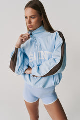 THE GROUNDS TRACK JACKET - BABY BLUE