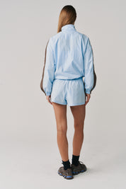 THE GROUNDS TRACK JACKET - BABY BLUE